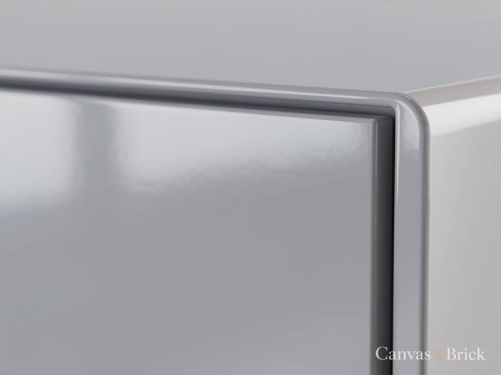 High-gloss acrylic cabinet shutter with a seamless mirror-like finish