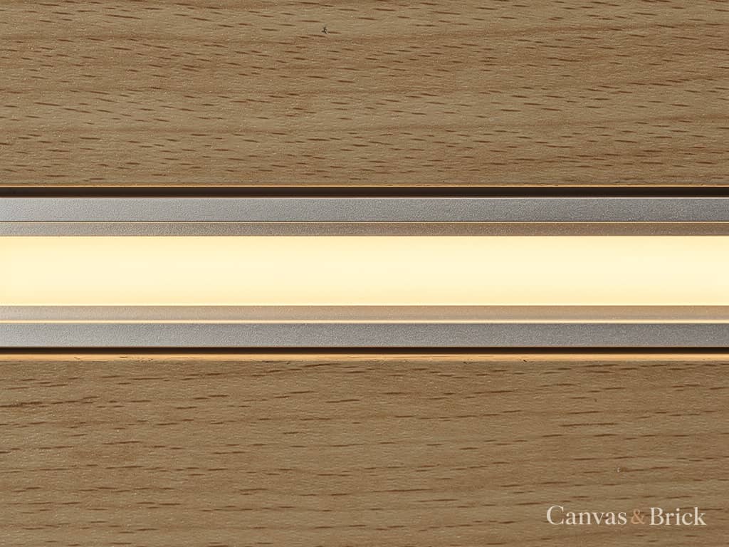 Recessed aluminium LED profile with a frosted diffuser glowing an even warm 2700K line