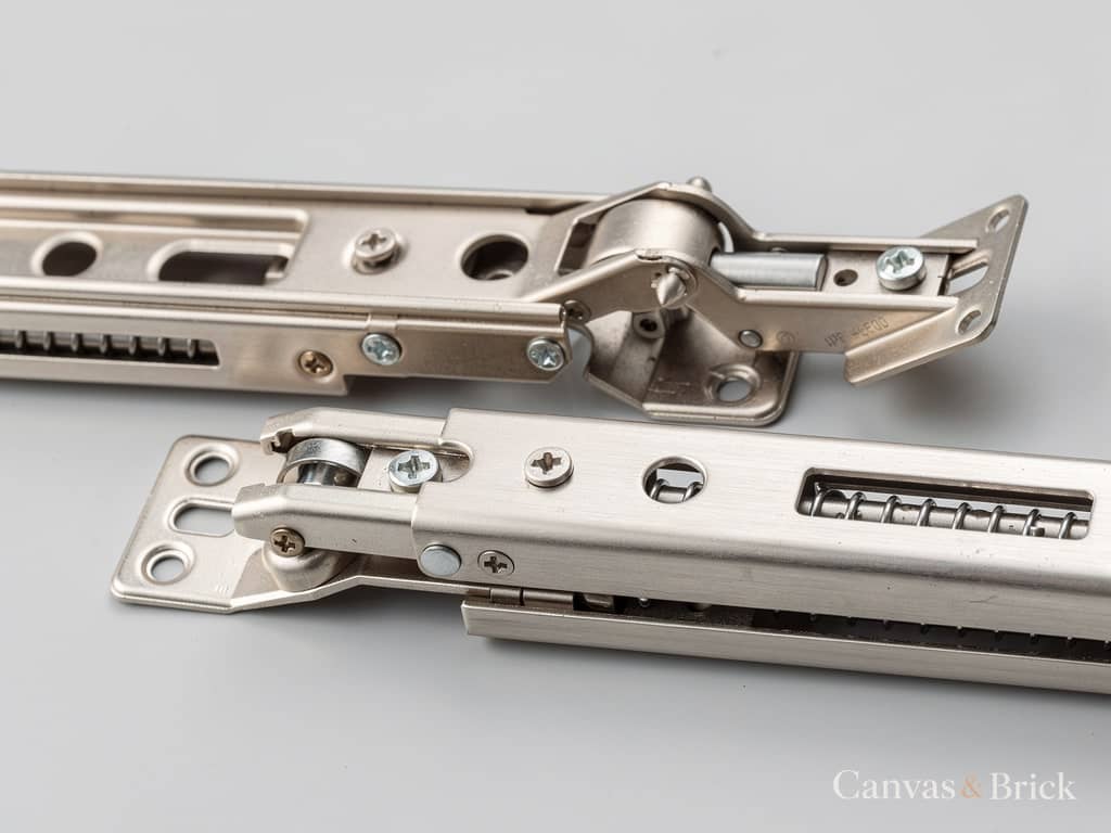 Soft-close hinge and full-extension drawer runner in brushed nickel-plated steel