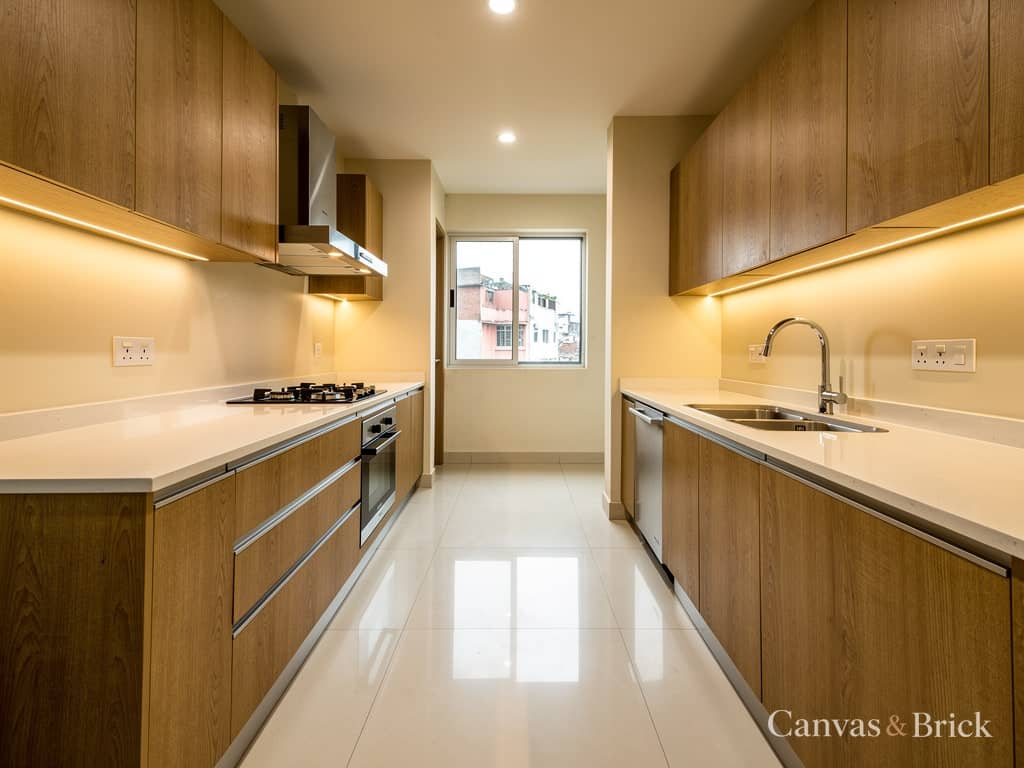 Parallel / galley modular kitchen design in Kolkata by Canvas & Brick